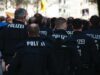 police standing on road during daytime