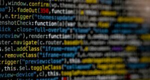 yellow and blue data code displayed on screen