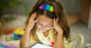 girl sitting on chair