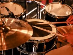 brown and black drum set