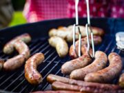 sausage grilled on griller outdoors