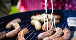sausage grilled on griller outdoors