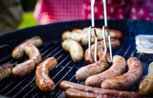 sausage grilled on griller outdoors