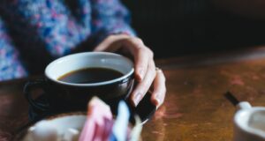 person drinking tea