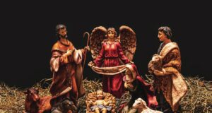 3 men sitting on ground