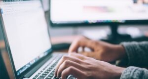 person using MacBook Pro