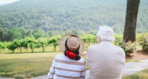 couple sitting on pathway