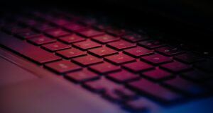 a close up of a keyboard with a blurry background