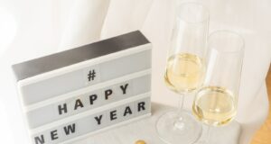 a couple of glasses of wine sitting on top of a table