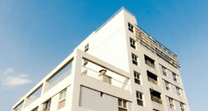 white concrete building under blue sky during daytime