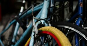 three blue bicycles
