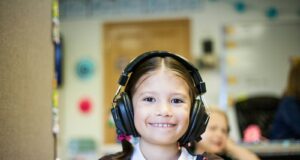 girl wearing black headphones