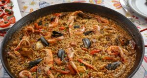 cooked food on black round plate