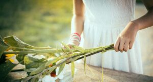 woman holding flowers