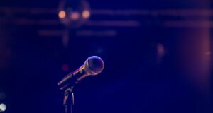 black and gray microphone on black stand