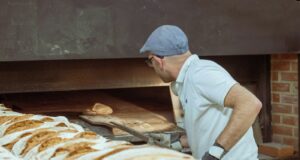 man wearing white polo shirt