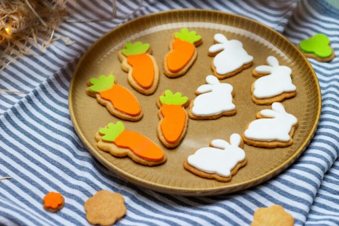 Photo by Wouter Supardi Salari a plate of decorated cookies on a table