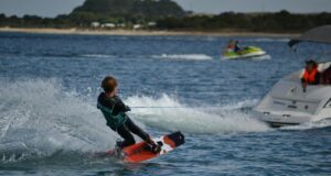 a kid riding a surfboard