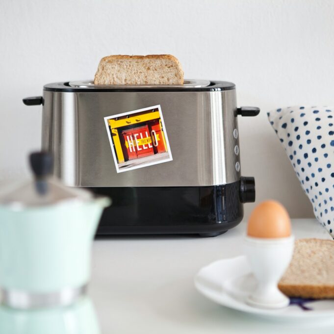 a toaster sitting on top of a white counter
