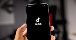 person holding black iphone 5