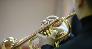 a person playing a trumpet
