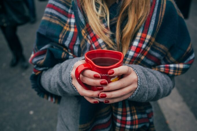 Photo by Alisa Anton woman holding a mug