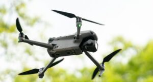 a close up of a black remote controlled flying device
